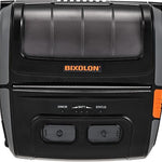A Bixolon black thermal label printer with an orange logo and an orange side switch, shown against a plain white background.
