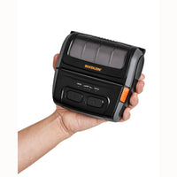 A black Bixolon thermal receipt printer with a paper print roll coming out of the top, shown on a clean white background.