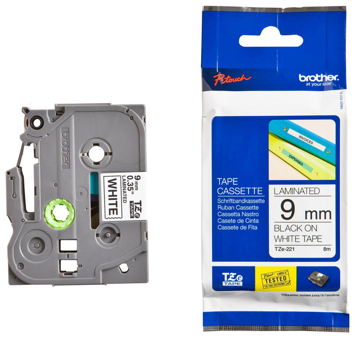 Dymo white plastic label refill tape in its original retail blister packaging, featuring a black tape roll inside a clear plastic casing on a green and white card backing.