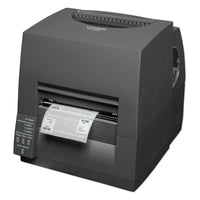 Citizen CL-S7008 barcode label printer with a gray chassis, a green display screen, and a white label sheet partially ejected, shown on a plain white background.