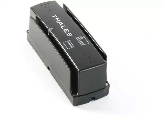 A black Thales electronic device, likely a sensor module or adapter, shown at an angle on a plain white background.
