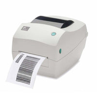A black Zebra Thermal printer with a yellow power button and a white label tray, shown on a white background.
