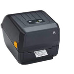 A Zebra T120 thermal label printer in black with a small yellow button on the side and a white label tray at the front, shown on a plain white background.