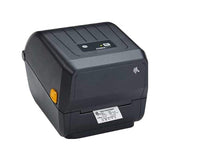 A Zebra T120 thermal label printer in black with a small yellow button on the side and a white label tray at the front, shown on a plain white background.