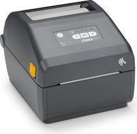 A Zebra QR-ZD421 barcode label printer in dark gray, shown with a white label sheet partially ejected from the front. The printer features a black control panel with a small LCD screen and directional buttons, set against a clean white background.